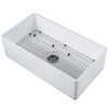 Holbrook Pure Stone Farmhouse 33 in. Single Bowl Kitchen Sink with Grid and Strainer in White